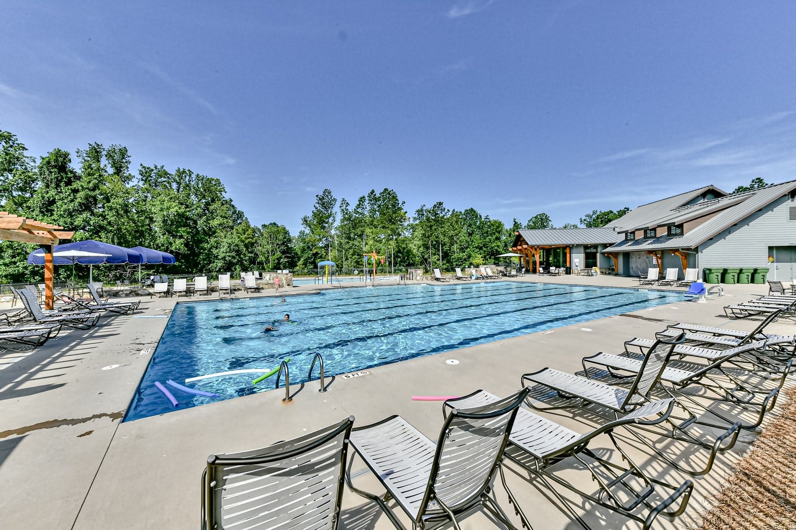 The Masons Bend lap pool with lounge seating