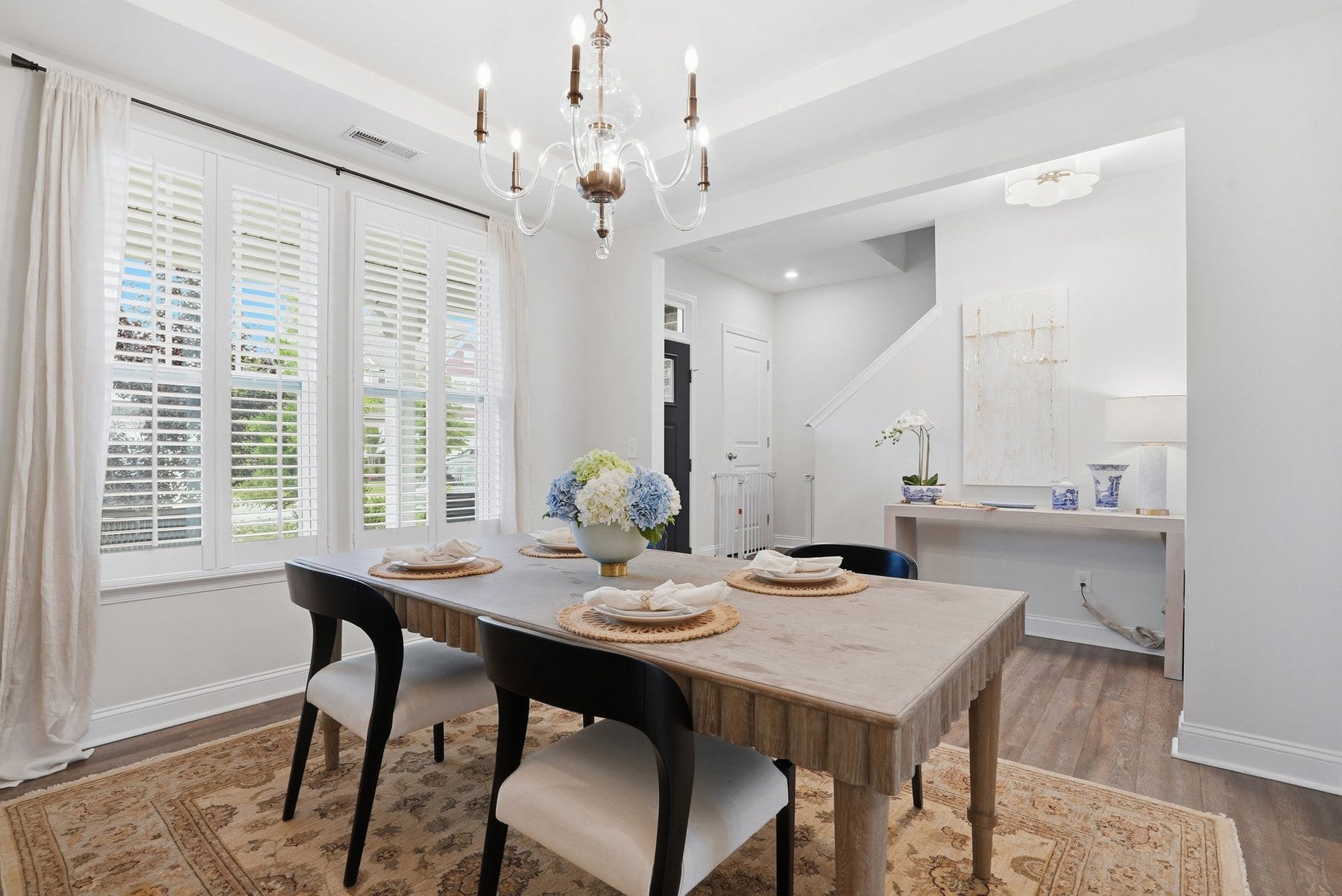 Dining room open to the kitchen and stairs